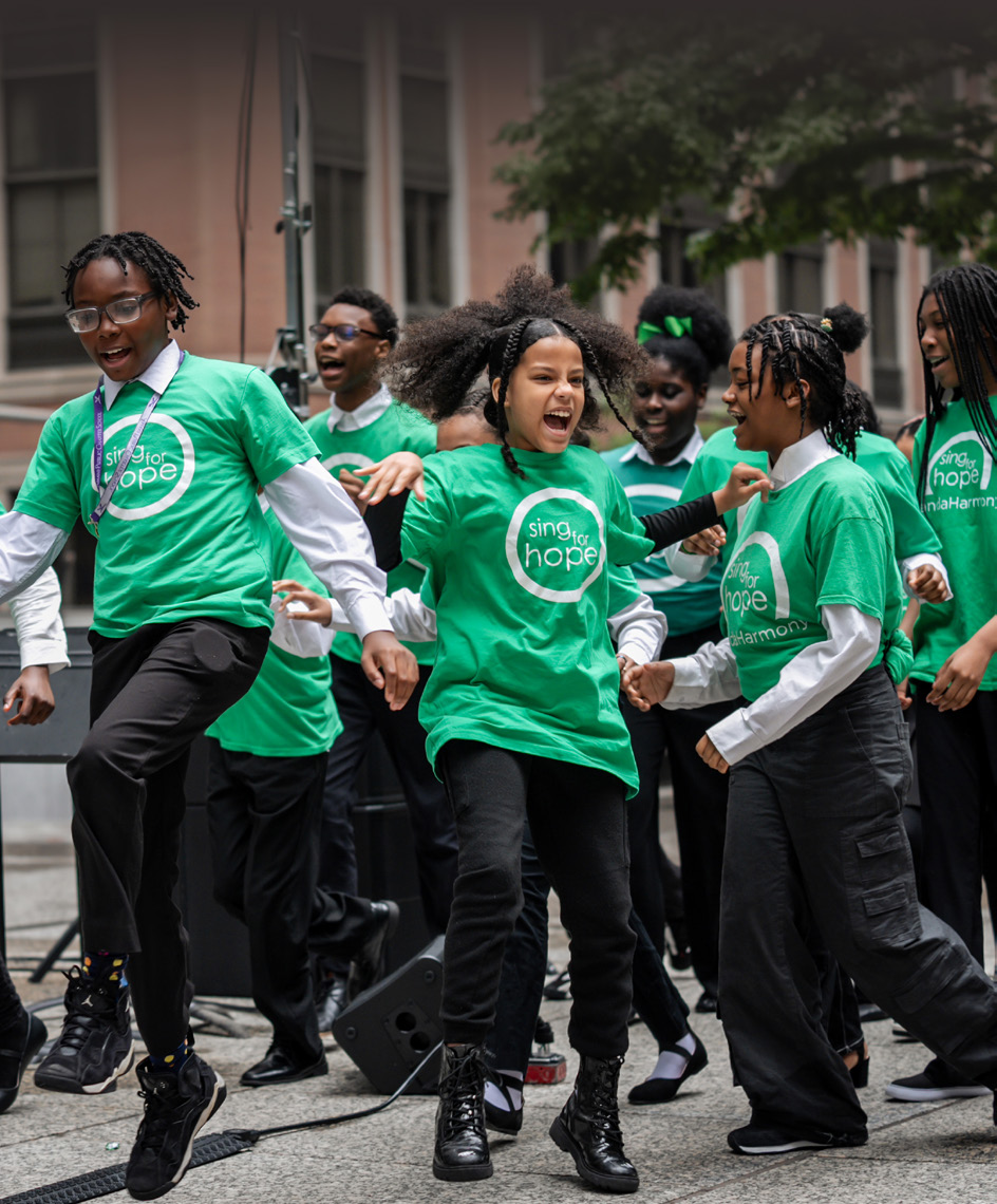 Students in Sing for Hope shirts