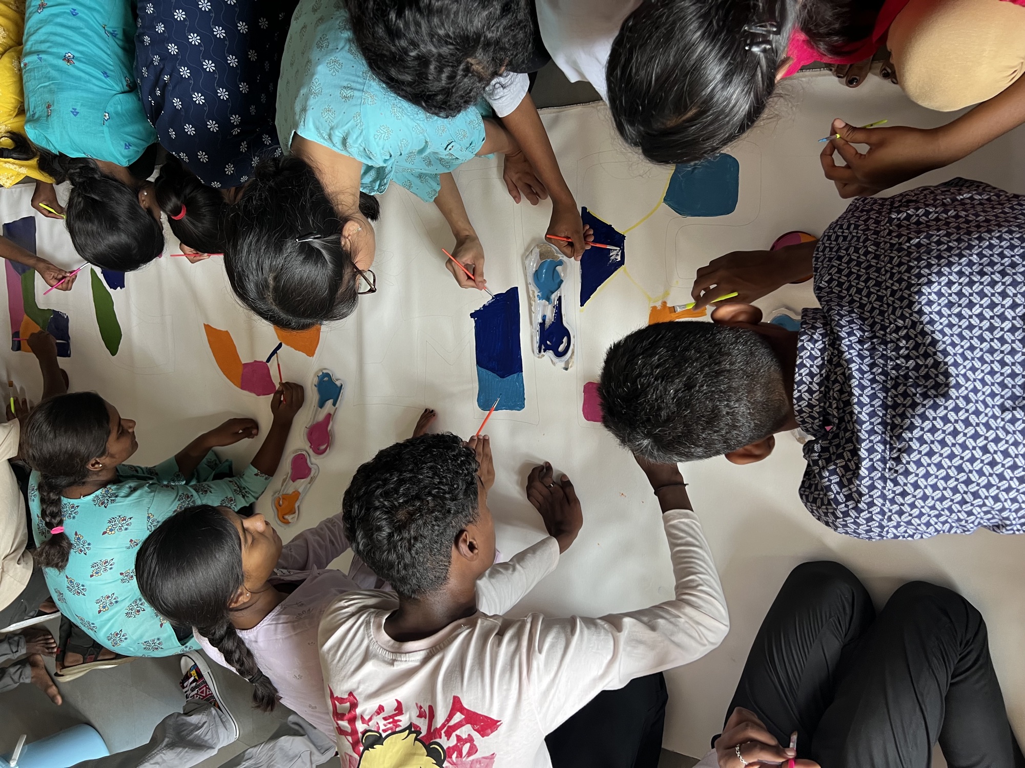 Sing for Hope students creating energy-themed collaborative art